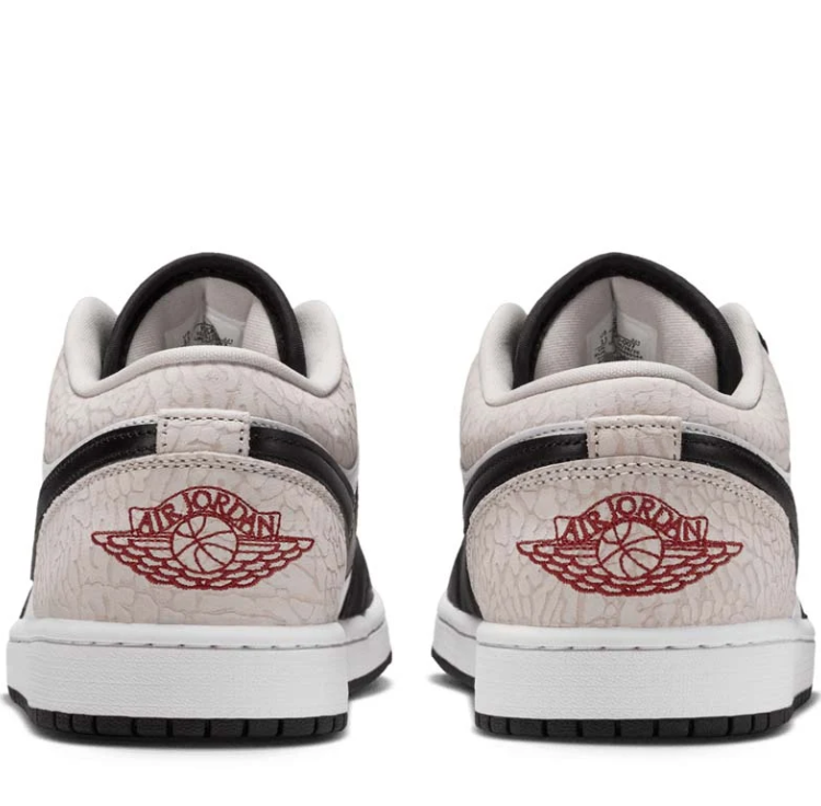 Air Jordan Low-Top Sneakers – Black & White with Crackle-Texture Heel